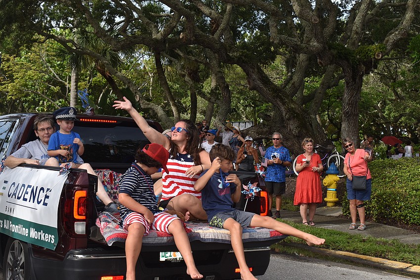Finn Fontaine and Ollie and Katie Kimbrell in the Cadence Bank float.