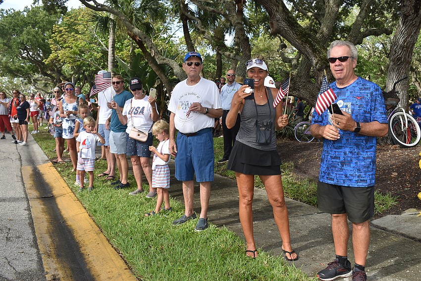 Residents and visitors lined Bay Isles Road for the parade.