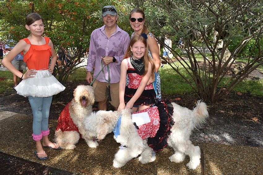 Lark, Steve, Heather and Bliss Rippy with dogs Scout and Camper