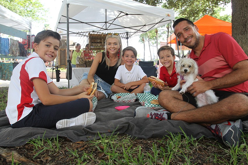 Matias, Thavey, Koa, Emilio and Juan Cordoba with Lana the dog.