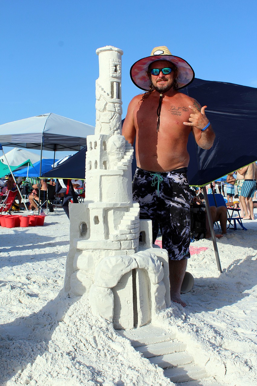 Tony Hammonds, a member of the Sand Monkeys sculpting team, arrived at the beach around 7 a.m. to make a sculpture.