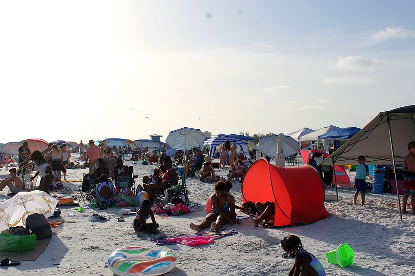 Thousands of people flocked to the beach to watch the fireworks display.