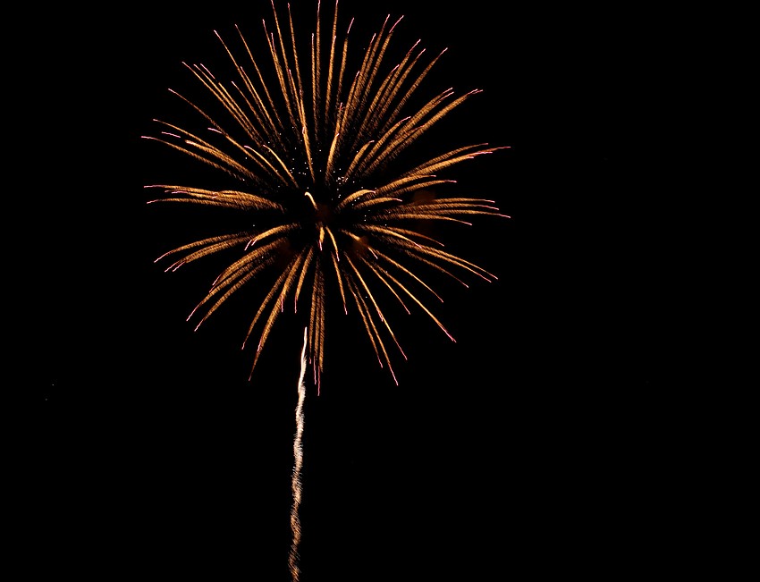 Various colored fireworks lit up the sky along Siesta Beach.