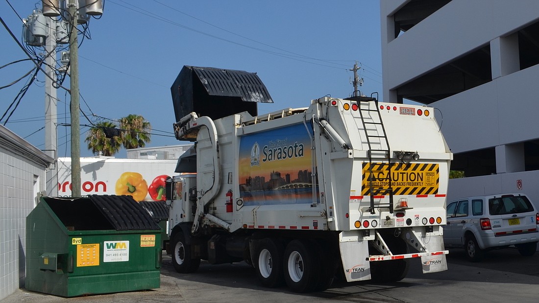 The city will not pick up trash, recycling and yard waste on Tuesday. File photo.