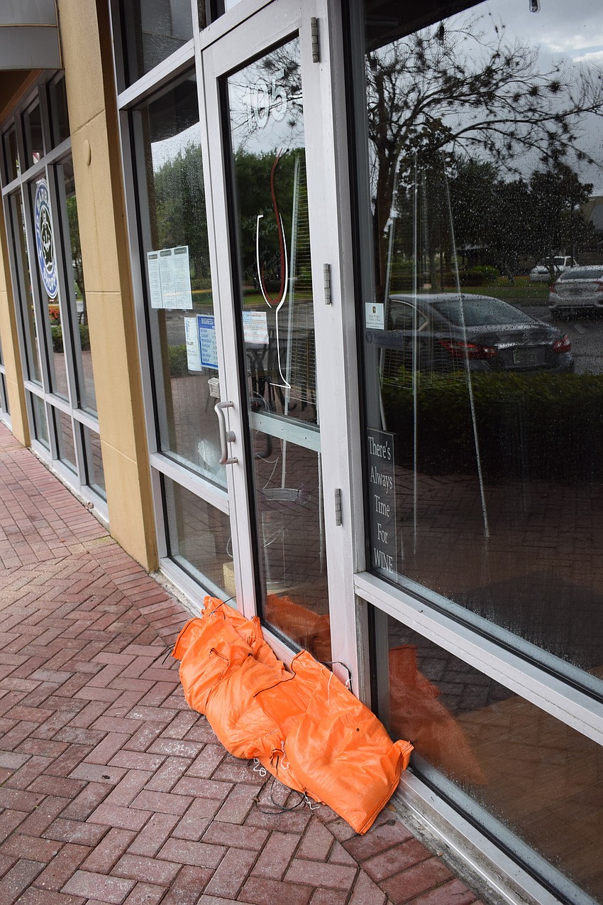 Only a few stores at Main Street at Lakewood Ranch put sand bags in front of their doors. Photo by Jay Heater