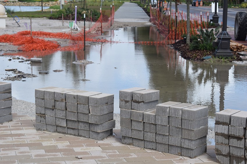Some construction sites had to deal with the pooling of water. Photo by Jay Heater