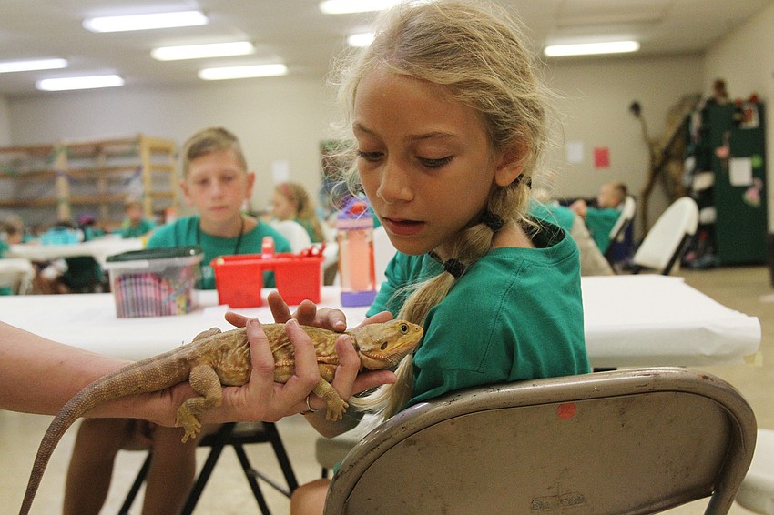 Soly Barbosa, 10, pets Potato.
