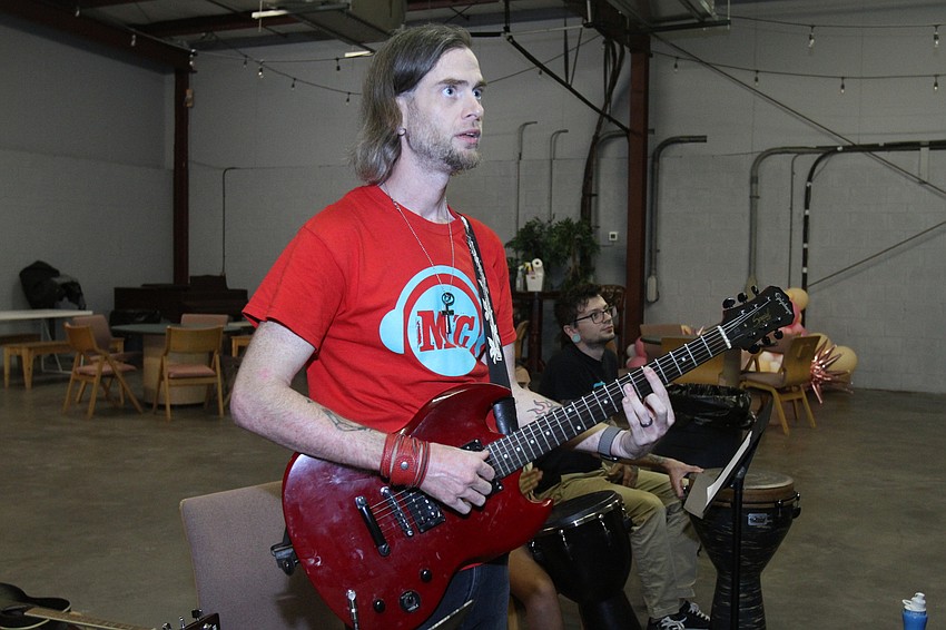Instructor Aaron Schiavone leads campers in classic rock class.