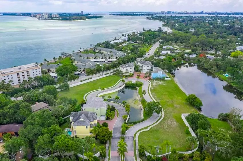 An entire neighborhood on Siesta Key was sold. The new owners will now sell off the lots individually.
