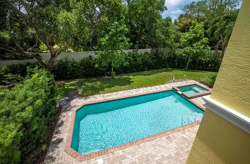 The first home for sale features a pool.