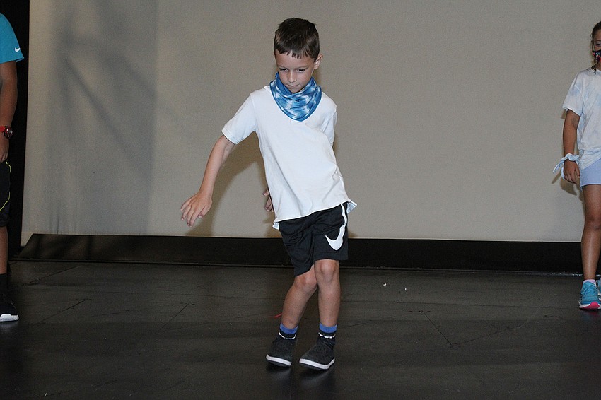 Grayer McLean dances along.