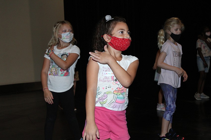 Maya Musmar dances along.