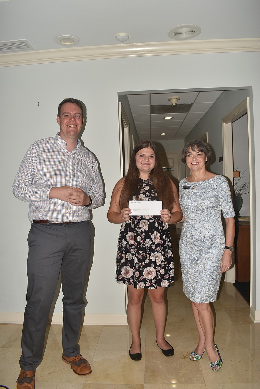 Jonathan Evans and Emma Bittar from Healthy Teens Coalition with Sharon Gould.