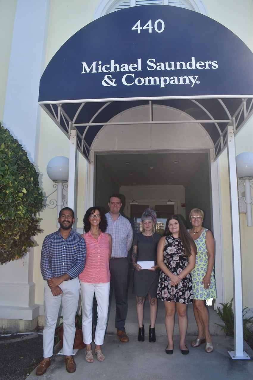 Diego Velasco and Peg Hughes from Visible Men Academy, Jonathan Evans from Healthy Teens Coalition, Megan Howell from Second Heart Homes, Emma Bittar from Healthy Teens Coalition and Brenda Zofrea from Visible Men Academy.