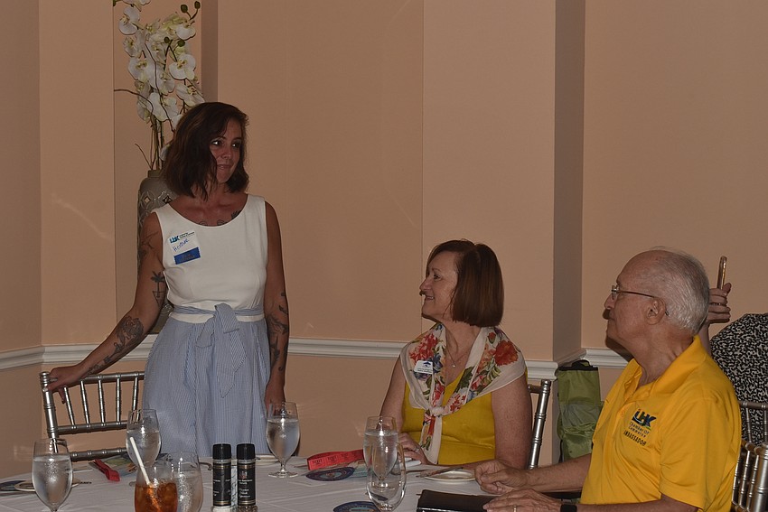 Heather Gaus introduced her business Turtle Coffee Bar while Gayle Goodfriend and Dennis Hassell listened.