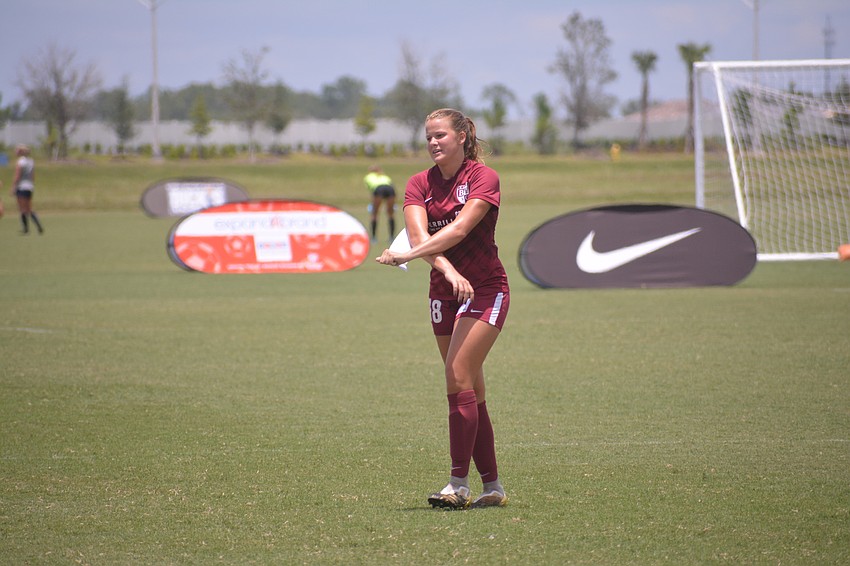 Lauren Ragazzone takes off her captain's armband after the game.
