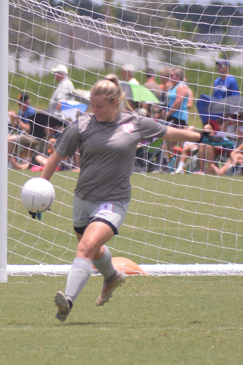 Ashton Pennell boots a goal kick for the Pirates.