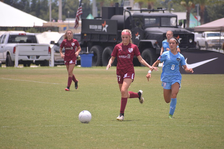 Anabel Mallard cuts off a Cleveland FC player going for the ball.