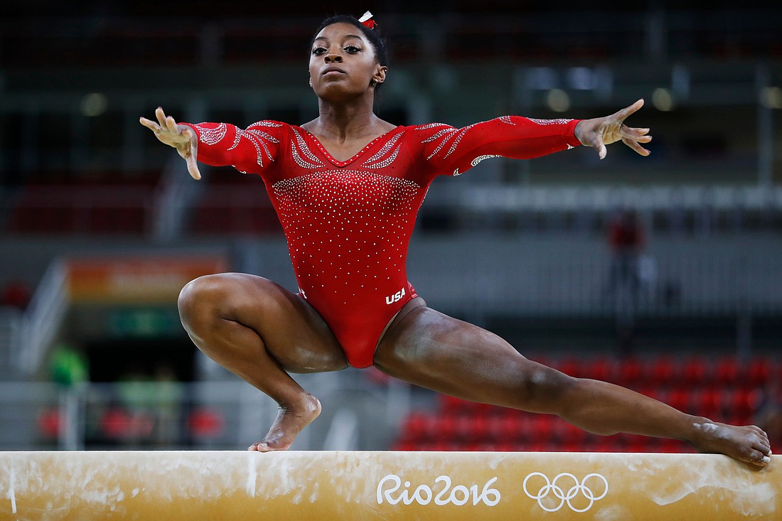 Gymnast Simone Biles will look to add to her four gold medals at the Tokyo Olympics. She&#39;s one of columnist Ryan Kohn&#39;s athletes to watch. Courtesy photo.