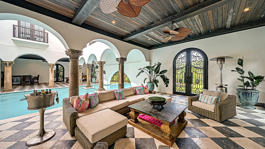 Alongside the courtyard and pool are  lounging areas.