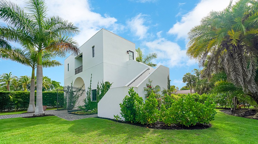 The one-bedroom guest house is built above the main driveway.