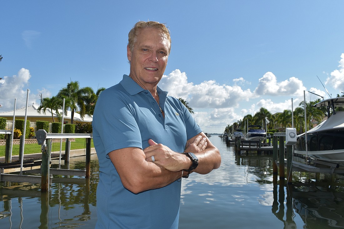 Country Club Shores resident Christopher Sachs was pleased the canal between Yardarm Lane and Bowsprit Lane was mostly clear by the time he returned home. Sachs is pictured here on July 22.