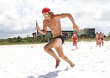 Dillman Wesley of Volusia County races across the sand.