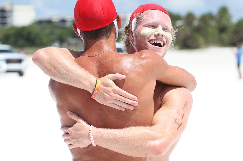 Gavin Zigler of Volusia hugs his teammate.