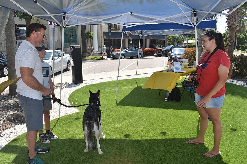 Rachel Merritt, right, snapped photos for Family Day as part of the Sol of the Circle series of events.