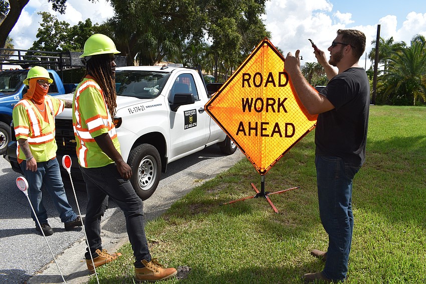 Volt Power Co. groundsman Jared Truxillo instructed Southeastern Traffic Supply workers Xavier Wilson and Andrew Windsor on July 22.