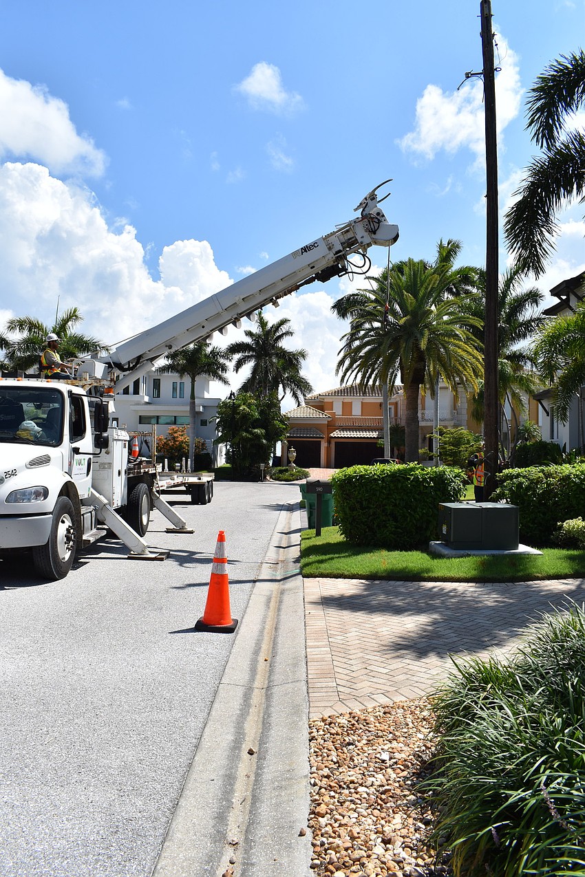 On July 22, Volt Power Co. lineman Heston Braddock worked to remove a light pole from Birdie Lane.