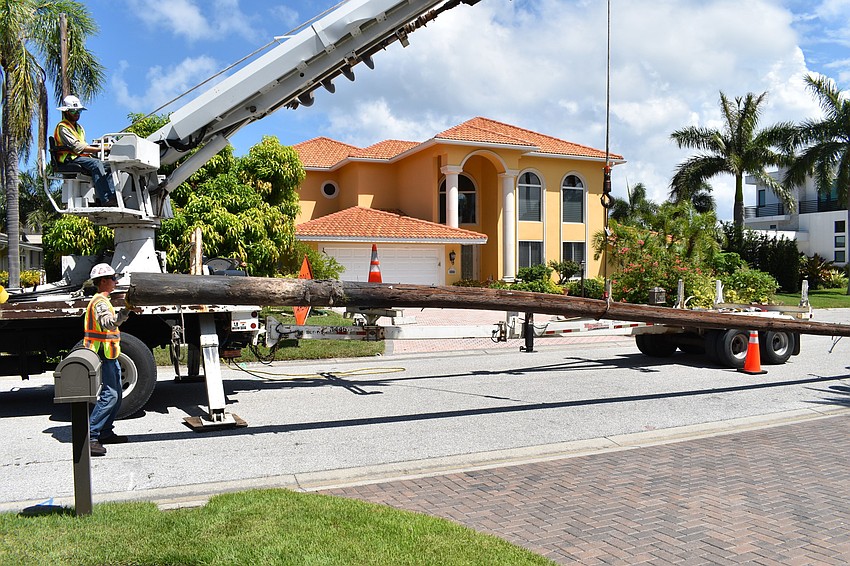On July 22, Volt Power Co. workers removed several light poles along Birdie Lane.