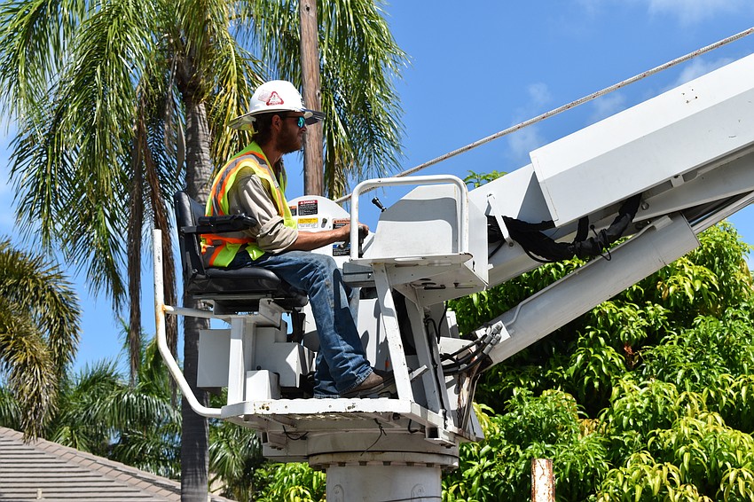 On July 22, Volt Power Co. lineman Heston Braddock worked to remove a light pole from Birdie Lane.