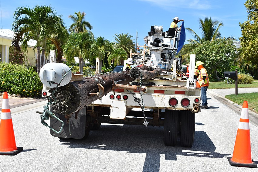 On July 22, Volt Power Co. workers removed several light poles along Birdie Lane.