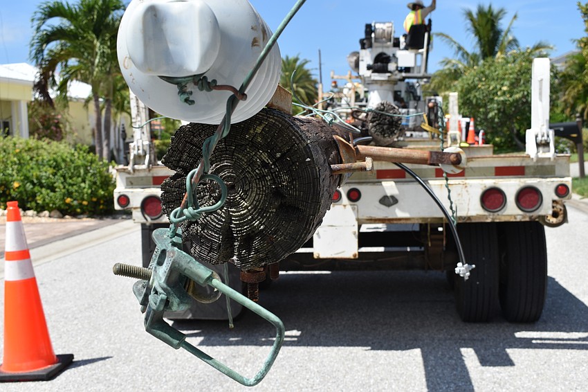 On July 22, Volt Power Co. workers removed several light poles along Birdie Lane.