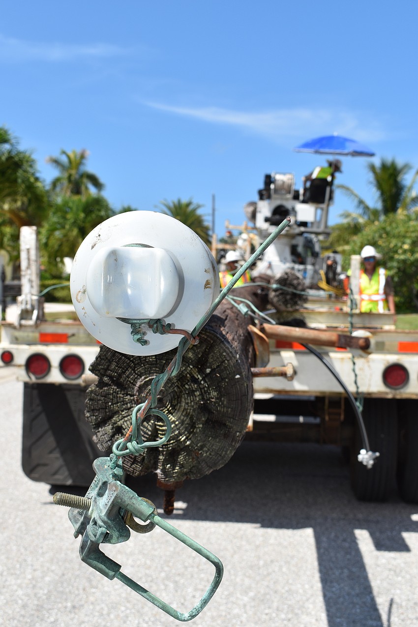 On July 22, Volt Power Co. workers removed several light poles along Birdie Lane.