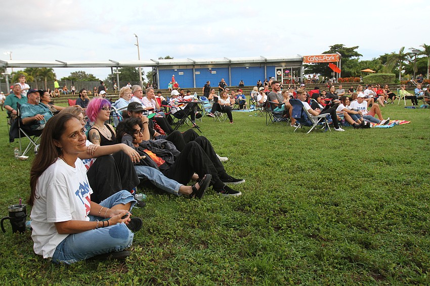 Attendees sat out on blankets and lawn chairs.