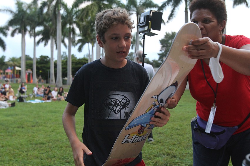 Benjamin Banoczy, 12, won a skateboard at the event.