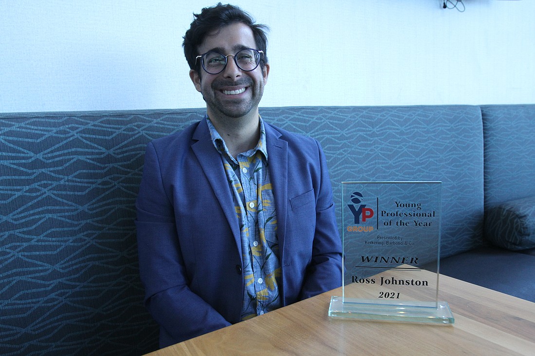 Ross Johnston attributed his love of connecting people and volunteering for his Young Professional of the Year win.