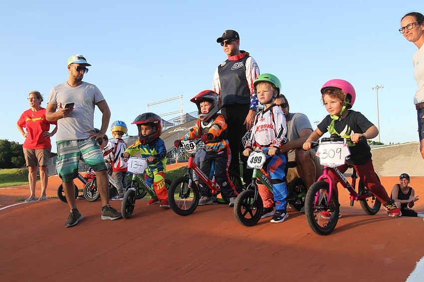 Riders and parents prepare for the race for 2-5 year olds.