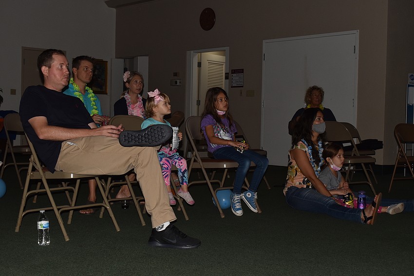 Attendees set up close to the screen and settled in for the movie.