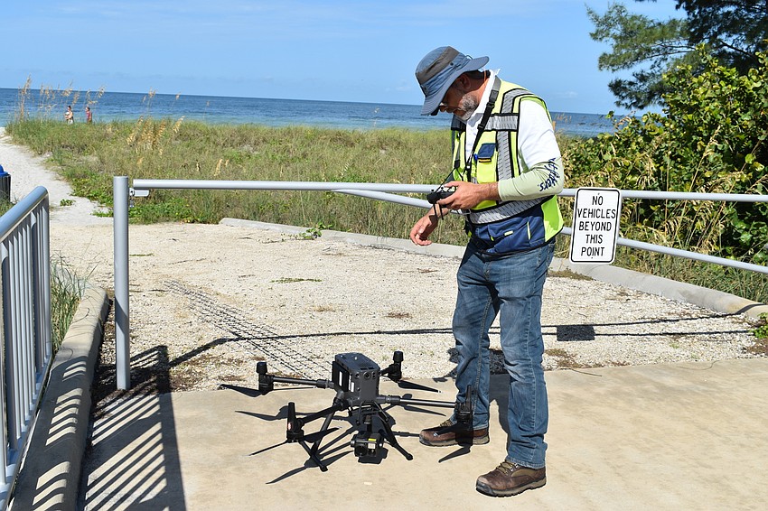 Buildings and facilities technology coordinator Hjalmar Pachas guided the  DJI Matrice 300 RTK to a safe landing.