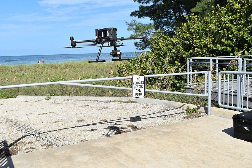 Buildings and facilities technology coordinator Hjalmar Pachas guided the  DJI Matrice 300 RTK to a safe landing.