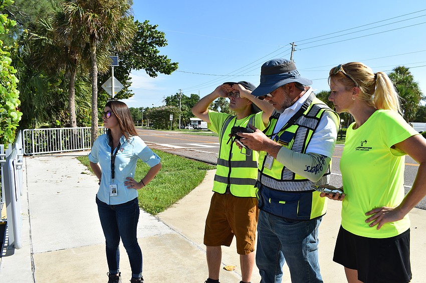 Lea Harper, Alex Harkinson, Hjalmar Pachas and Melissa Matisko watch as the DJI Matrice 300 RTK was in the air.