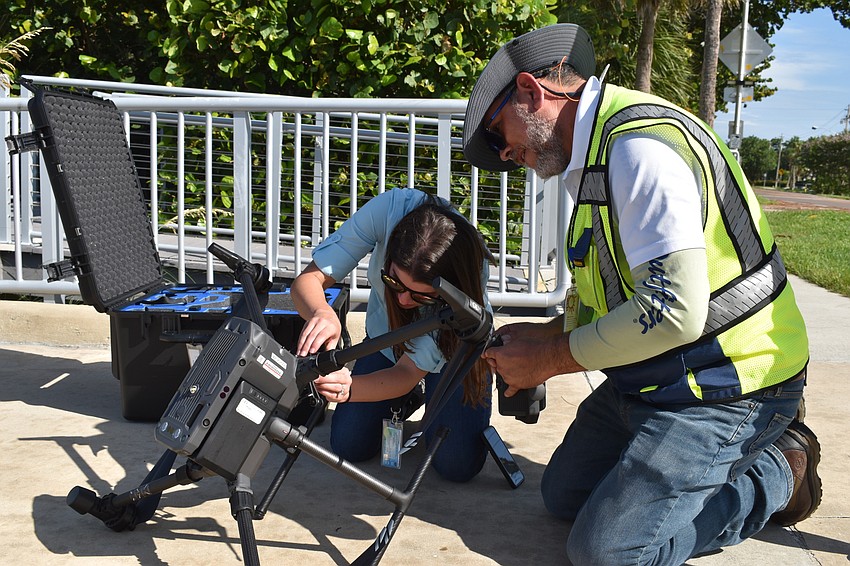 Lea Harper and Hjalmar Pachas prepared the DJI Matrice 300 RTK before it took off.