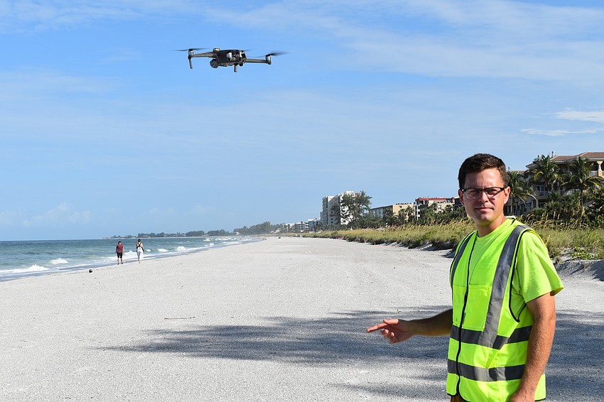 Alex Harkinson prepares himself to catch the DJI Mavic 2 Pro drone.