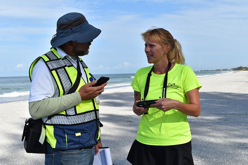 Hjalmar Pachas and Melissa Matisko chatted on the beach.