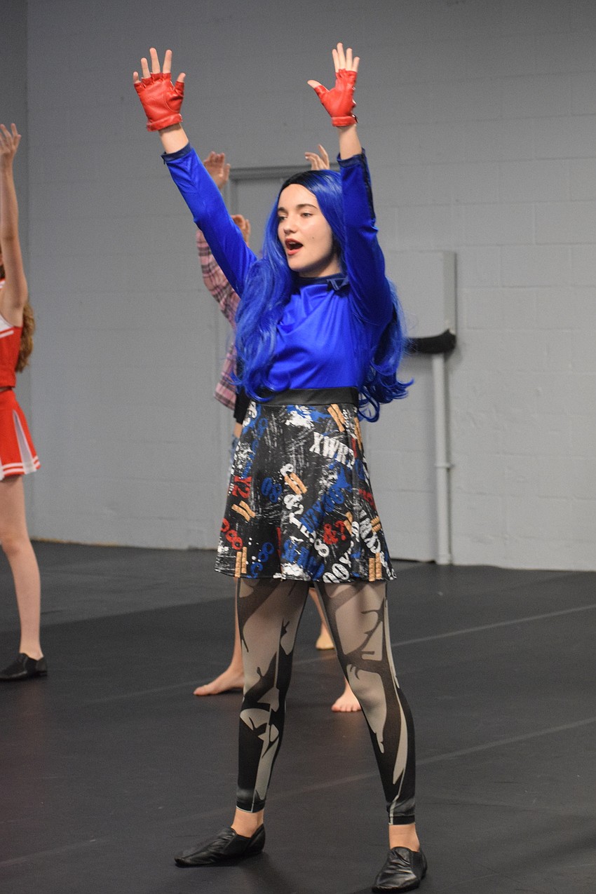 Lucy Gehrke dances in unison with the rest of Ovation Troupe.