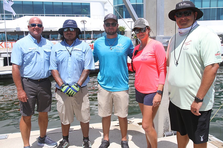 Todd Willians, Levi Palacios, Patrick Lustro, Kat Ross and Hunter Spitler helped handle the boats  and fish.