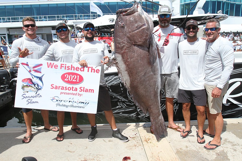 The Gulf Shore Offshore team poses with its 320 pound warsaw grouper.